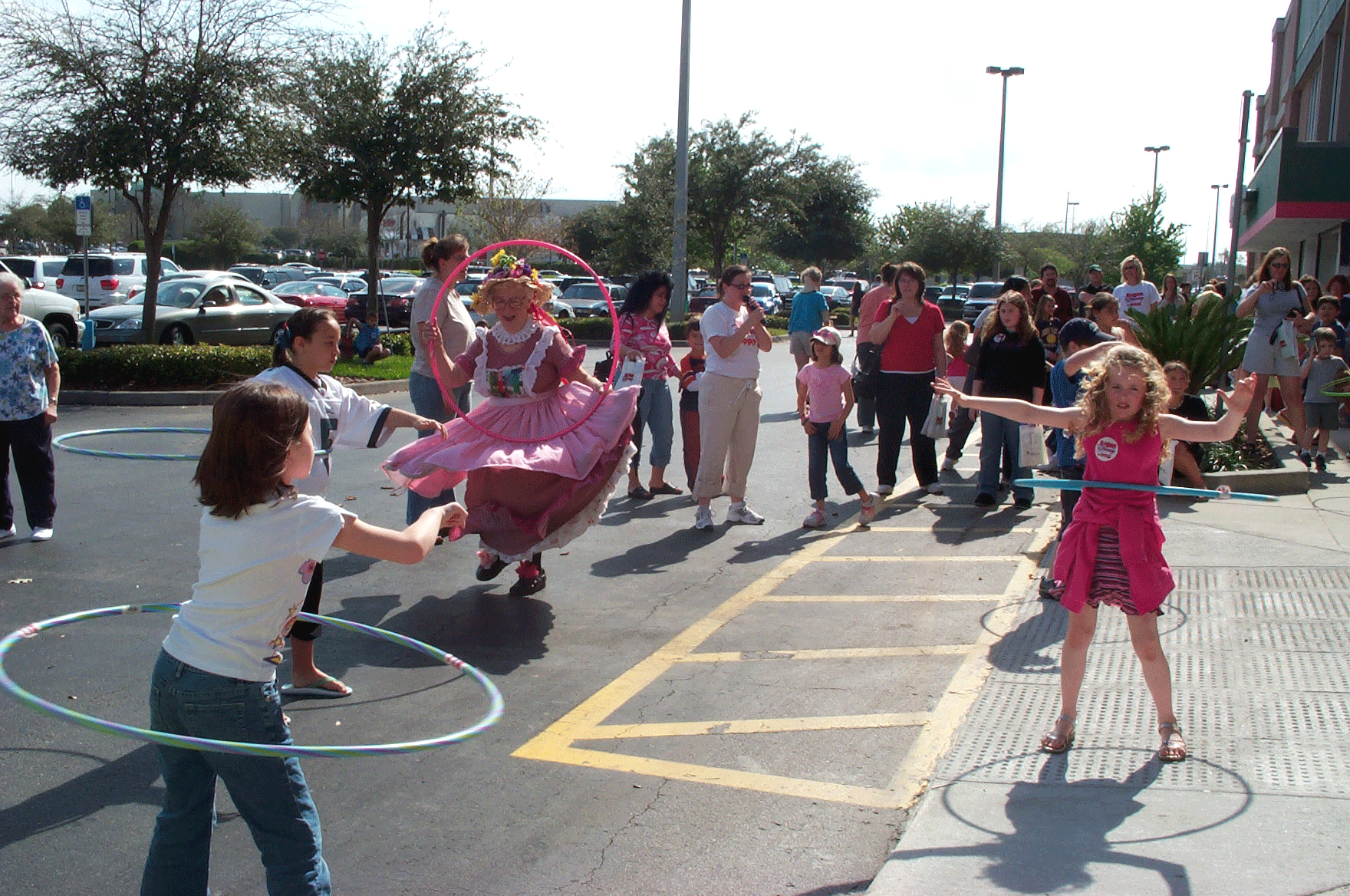 Grandma with hula hoop at Radio Disney event
